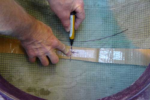 Marking the interior hull to show the centre point of the seat